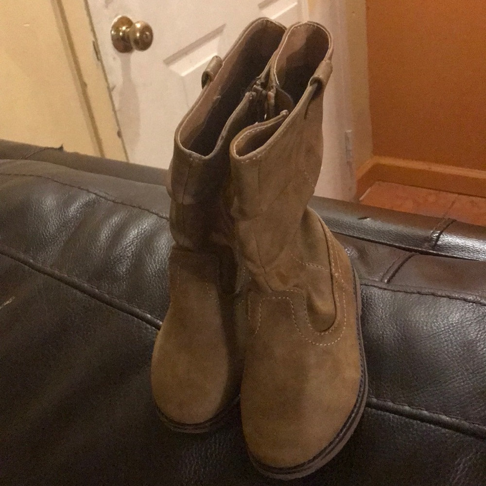 Brown boots from children place.